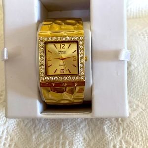Gold tone Embassy by Gruen Ladies Watch. With complimentary box.